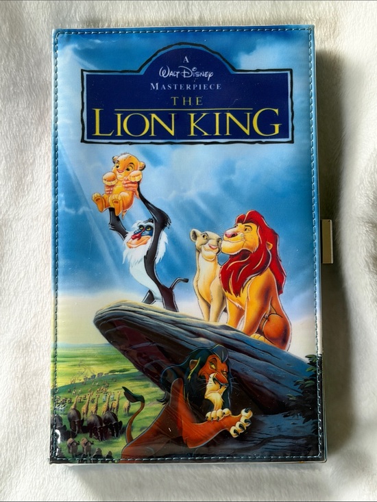 Disney Handbags - Disney The Lion King Vinyl Clutch - GUC